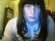 Slutty crosdresser plays in front of the webcam
